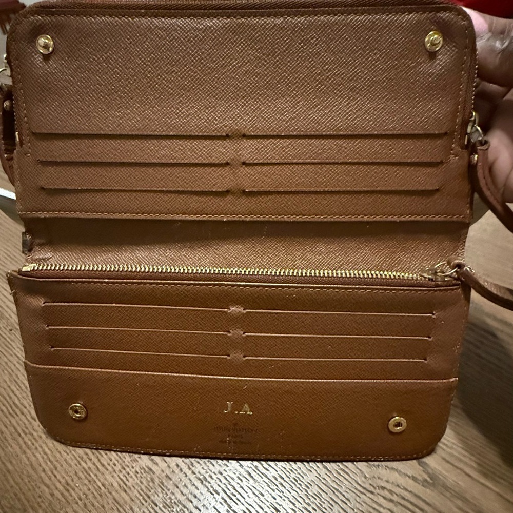 Louis Vuittton Insolite Monogram (J. A.) Leather Wallet.